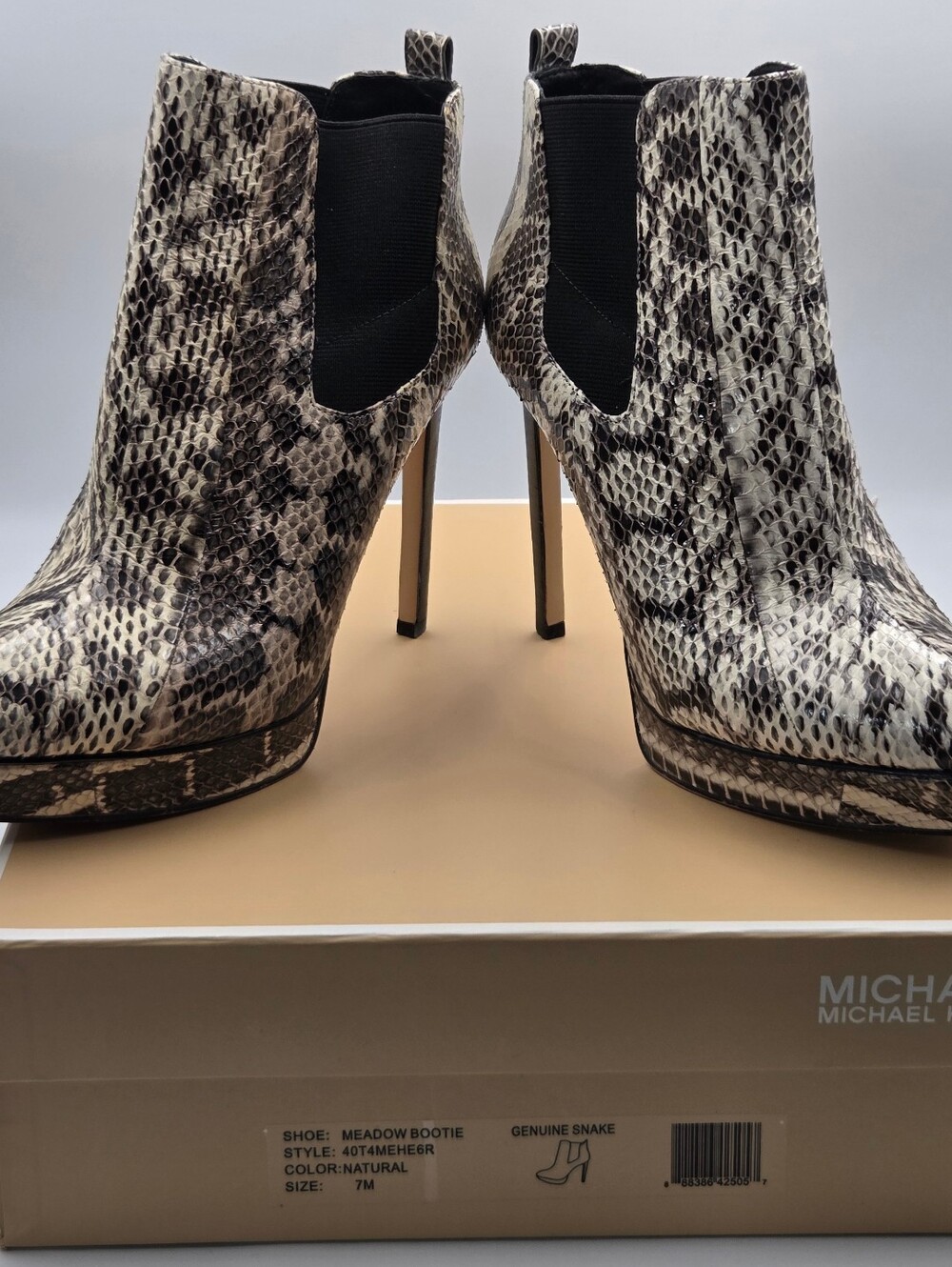 MICHAEL Michael Kors Meadow Platform Ankle Booties in the Natural colorway
